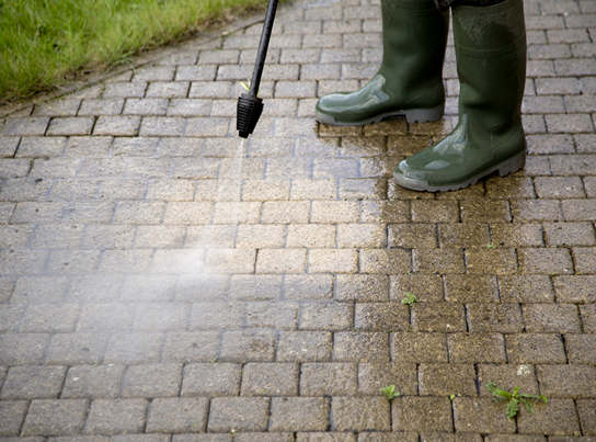 Presure washing concrete pavers in Ohio.